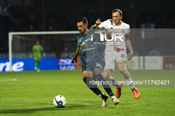 Giuseppe Fella of Cavese and Emmanuele Salines of Foggia participate in the Serie C match between Cavese and Foggia at Stadio Simonetta Lamb...