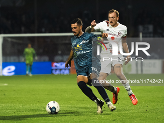 Giuseppe Fella of Cavese and Emmanuele Salines of Foggia participate in the Serie C match between Cavese and Foggia at Stadio Simonetta Lamb...