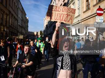 People attend a demonstration against the Polish government's plans to suspend the right to asylum for refugees illegally crossing the Polis...