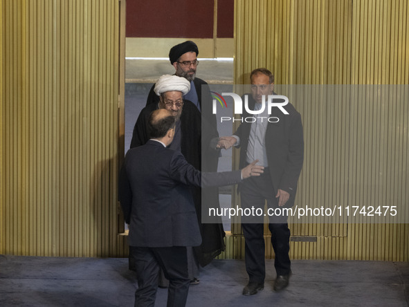 Iranian clerics arrive at the old Iranian Parliament building to take part in Iran's Assembly of Experts' biannual meeting in Tehran, Iran,...