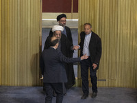 Iranian clerics arrive at the old Iranian Parliament building to take part in Iran's Assembly of Experts' biannual meeting in Tehran, Iran,...