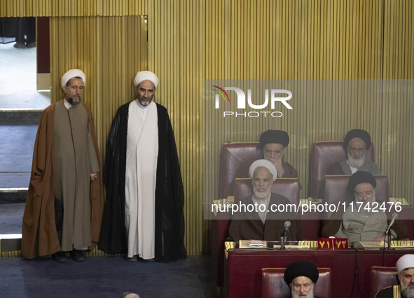 Iranian clerics arrive at the old Iranian Parliament building to take part in Iran's Assembly of Experts' biannual meeting in Tehran, Iran,...