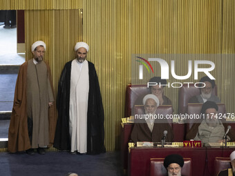 Iranian clerics arrive at the old Iranian Parliament building to take part in Iran's Assembly of Experts' biannual meeting in Tehran, Iran,...