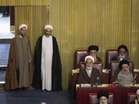 Iranian clerics arrive at the old Iranian Parliament building to take part in Iran's Assembly of Experts' biannual meeting in Tehran, Iran,...