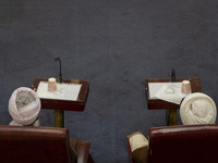 Shi'ite and Sunni Iranian clerics sit next to each other while participating in Iran's Assembly of Experts' biannual meeting at the old Iran...