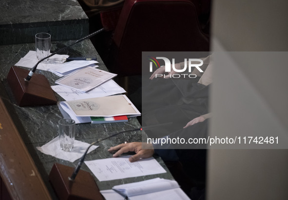 Iranian clerics sit at the old Iranian Parliament building during Iran's Assembly of Experts' biannual meeting in Tehran, Iran, on November...