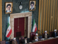 Ayatollah Mohammad-Ali Movahedi Kermani gives the opening speech during Iran's Assembly of Experts' biannual meeting in the old Iranian Parl...