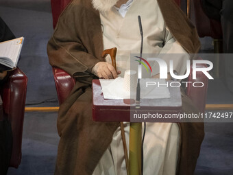 Ultra Conservative Shi'ite Iranian cleric, Ayatollah Sayyid Ahmad Alamolhoda, sits at the old Iranian Parliament building while taking part...