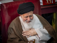 Ultra Conservative Shi'ite Iranian cleric, Ayatollah Sayyid Ahmad Alamolhoda, gestures as he sits at the old Iranian Parliament building dur...