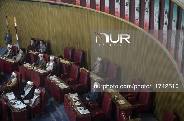 Iranian clerics sit at the old Iranian Parliament building during Iran's Assembly of Experts' biannual meeting in Tehran, Iran, on November...