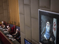 Ayatollah Mohammad-Ali Movahedi Kermani (3rd L) gives the opening speech during Iran's Assembly of Experts' biannual meeting in the old Iran...