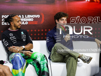 Franco Colapinto of Williams Racing and Lewis Hamilton of Mercedes AMG F1 Team W15 pose for a portrait during the Formula 1 Grand Prix of Br...