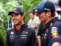 Sergio Perez and Max Verstappen of Red Bull Racing RB20 pose for a portrait during the Formula 1 Grand Prix of Brazil at Autodromo Jose Carl...