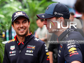 Sergio Perez and Max Verstappen of Red Bull Racing RB20 pose for a portrait during the Formula 1 Grand Prix of Brazil at Autodromo Jose Carl...