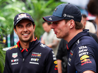 Sergio Perez and Max Verstappen of Red Bull Racing RB20 pose for a portrait during the Formula 1 Grand Prix of Brazil at Autodromo Jose Carl...