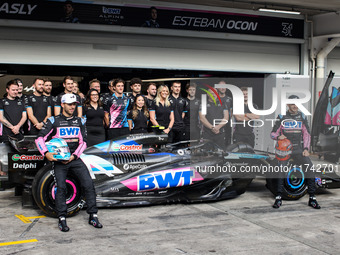 Pierre Gasly, Esteban Ocon, and Jack Doohan of the Alpine F1 Team A524 pose for a portrait during the Formula 1 Grand Prix of Brazil at Auto...