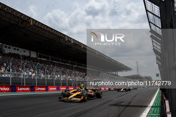 Lando Norris of the McLaren F1 Team MCL38, Oscar Piastri of the McLaren F1 Team MCL38, and Max Verstappen of Red Bull Racing RB20 participat...