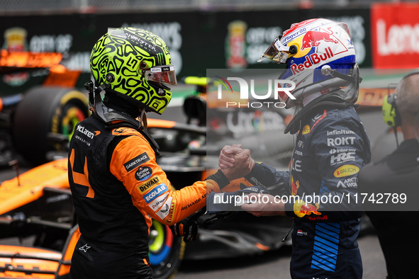 Lando Norris of McLaren F1 Team MCL38 and Max Verstappen of Red Bull Racing RB20 pose for a portrait during the Formula 1 Grand Prix of Braz...