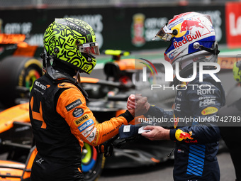 Lando Norris of McLaren F1 Team MCL38 and Max Verstappen of Red Bull Racing RB20 pose for a portrait during the Formula 1 Grand Prix of Braz...