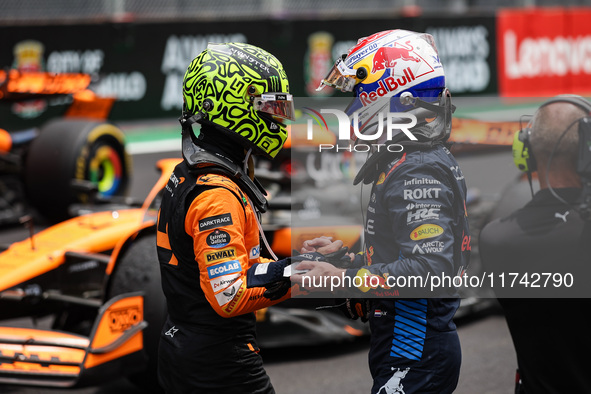 Lando Norris of McLaren F1 Team MCL38 and Max Verstappen of Red Bull Racing RB20 pose for a portrait during the Formula 1 Grand Prix of Braz...