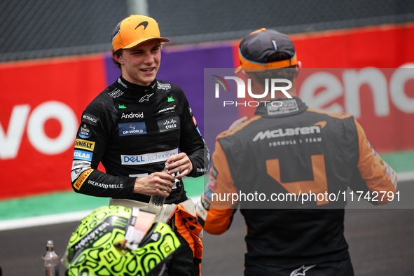 Oscar Piastri of the McLaren F1 Team MCL38 and Lando Norris of the McLaren F1 Team MCL38 pose for a portrait during the Formula 1 Grand Prix...