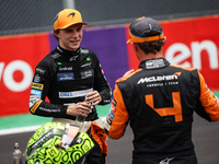 Oscar Piastri of the McLaren F1 Team MCL38 and Lando Norris of the McLaren F1 Team MCL38 pose for a portrait during the Formula 1 Grand Prix...