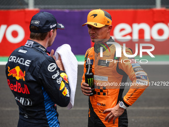 Max Verstappen of Red Bull Racing RB20 and Lando Norris of McLaren F1 Team MCL38 pose for a portrait during the Formula 1 Grand Prix of Braz...