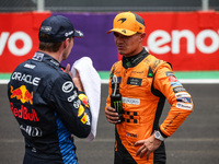 Max Verstappen of Red Bull Racing RB20 and Lando Norris of McLaren F1 Team MCL38 pose for a portrait during the Formula 1 Grand Prix of Braz...