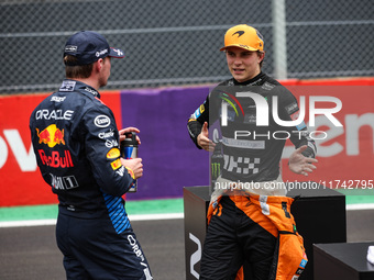 Max Verstappen of Red Bull Racing RB20 and Oscar Piastri of McLaren F1 Team MCL38 pose for a portrait during the Formula 1 Grand Prix of Bra...