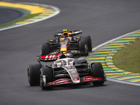 Oliver Bearman of Haas F1 Team VF-24 Ferrari and Sergio Perez of Red Bull Racing RB20 compete during the Formula 1 Grand Prix of Brazil at A...