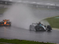 George Russell of the Mercedes AMG F1 Team W15 and Lando Norris of the McLaren F1 Team MCL38 participate in the Formula 1 Grand Prix of Braz...