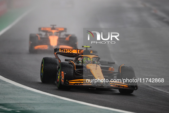 Lando Norris of the McLaren F1 Team, driving the MCL38, and Oscar Piastri of the McLaren F1 Team, also driving the MCL38, participate in the...