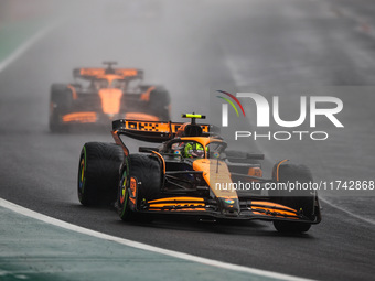 Lando Norris of the McLaren F1 Team, driving the MCL38, and Oscar Piastri of the McLaren F1 Team, also driving the MCL38, participate in the...