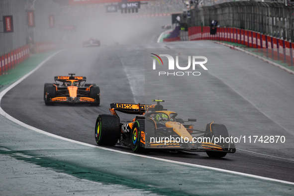 Lando Norris of the McLaren F1 Team, driving the MCL38, and Oscar Piastri of the McLaren F1 Team, also driving the MCL38, participate in the...