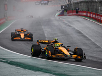 Lando Norris of the McLaren F1 Team, driving the MCL38, and Oscar Piastri of the McLaren F1 Team, also driving the MCL38, participate in the...