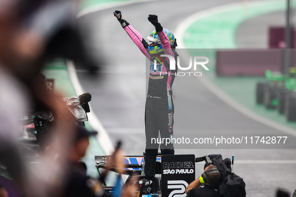 Esteban Ocon of the Alpine F1 Team celebrates his podium during the Formula 1 Grand Prix of Brazil at Autodromo Jose Carlos Pace in Sao Paul...