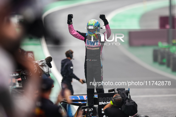 Esteban Ocon of the Alpine F1 Team celebrates his podium during the Formula 1 Grand Prix of Brazil at Autodromo Jose Carlos Pace in Sao Paul...