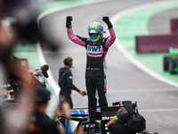 Esteban Ocon of the Alpine F1 Team celebrates his podium during the Formula 1 Grand Prix of Brazil at Autodromo Jose Carlos Pace in Sao Paul...