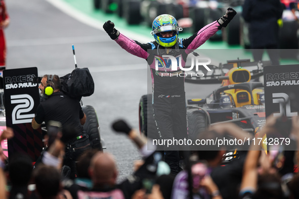 Esteban Ocon of the Alpine F1 Team celebrates his podium during the Formula 1 Grand Prix of Brazil at Autodromo Jose Carlos Pace in Sao Paul...