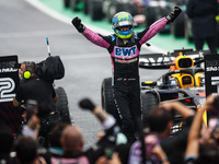 Esteban Ocon of the Alpine F1 Team celebrates his podium during the Formula 1 Grand Prix of Brazil at Autodromo Jose Carlos Pace in Sao Paul...