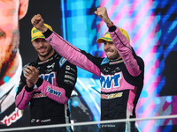 Esteban Ocon and Pierre Gasly of the Alpine F1 Team A524 celebrate their podium during the Formula 1 Grand Prix of Brazil at Autodromo Jose...