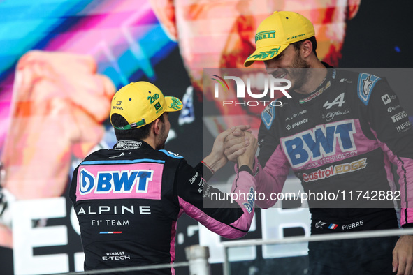 Esteban Ocon and Pierre Gasly of the Alpine F1 Team A524 celebrate their podium during the Formula 1 Grand Prix of Brazil at Autodromo Jose...