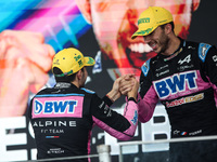 Esteban Ocon and Pierre Gasly of the Alpine F1 Team A524 celebrate their podium during the Formula 1 Grand Prix of Brazil at Autodromo Jose...