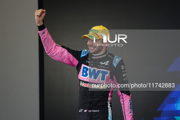 Esteban Ocon of the Alpine F1 Team A524 celebrates his podium during the Formula 1 Grand Prix of Brazil at Autodromo Jose Carlos Pace in Sao...