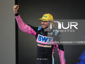 Esteban Ocon of the Alpine F1 Team A524 celebrates his podium during the Formula 1 Grand Prix of Brazil at Autodromo Jose Carlos Pace in Sao...