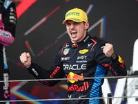 Max Verstappen of Red Bull Racing RB20 celebrates his victory on the podium during the Formula 1 Grand Prix of Brazil at Autodromo Jose Carl...