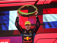 Max Verstappen of Red Bull Racing RB20 celebrates his victory on the podium during the Formula 1 Grand Prix of Brazil at Autodromo Jose Carl...