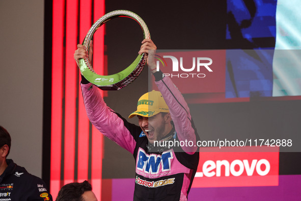 Esteban Ocon of the Alpine F1 Team A524 celebrates his podium during the Formula 1 Grand Prix of Brazil at Autodromo Jose Carlos Pace in Sao...