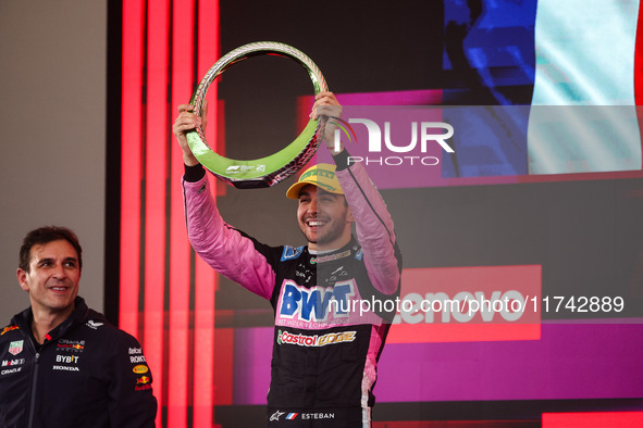 Esteban Ocon of the Alpine F1 Team A524 celebrates his podium during the Formula 1 Grand Prix of Brazil at Autodromo Jose Carlos Pace in Sao...