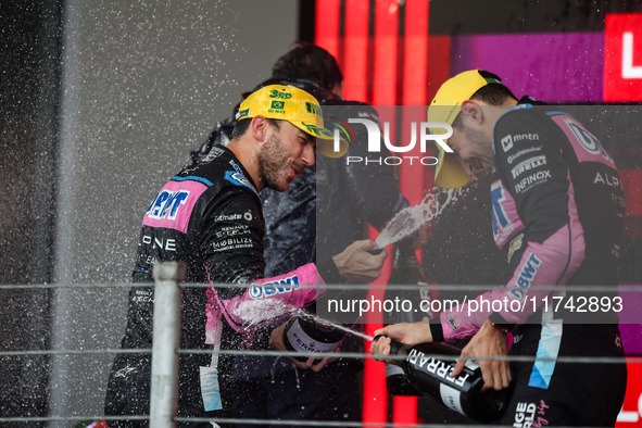 Esteban Ocon and Pierre Gasly of the Alpine F1 Team A524 celebrate their podium during the Formula 1 Grand Prix of Brazil at Autodromo Jose...